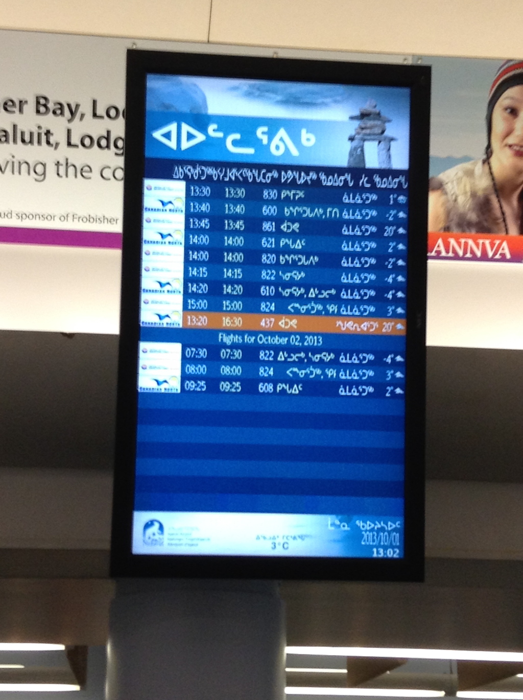 photo Departure screen. Iqaluit Airport